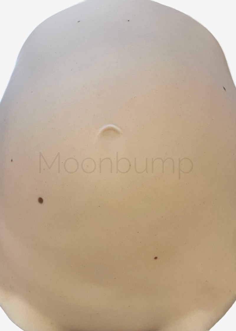 fake pregnant belly silicone detail moles and freckles in beige skin