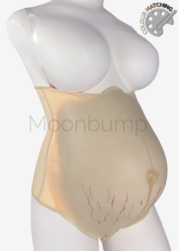 7-8 Month fake maternity belly, in colour M4 'beige' with linea nigra & stretch marks, shown on a mannequin