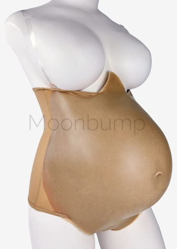 Silicone fake pregnant belly 9 months/twins by Moonbump, in colour M6 'light brown', shown on a mannequin