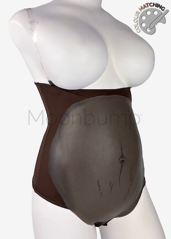 3-4 Month silicone imitation pregnancy belly, in colour M9 'dark brown' with linea nigra & stretch marks, shown on a mannequin